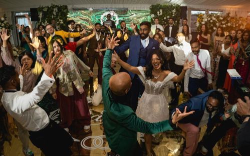 Ratha and Rath dancing alongside their guests